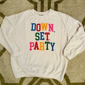 Judith March “Down, Set, Party” multicolored sweater